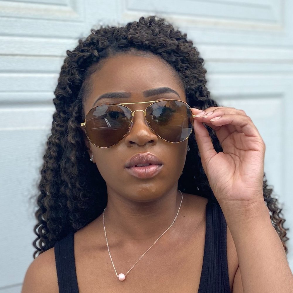 brown and gold tortoise shell sunglasses